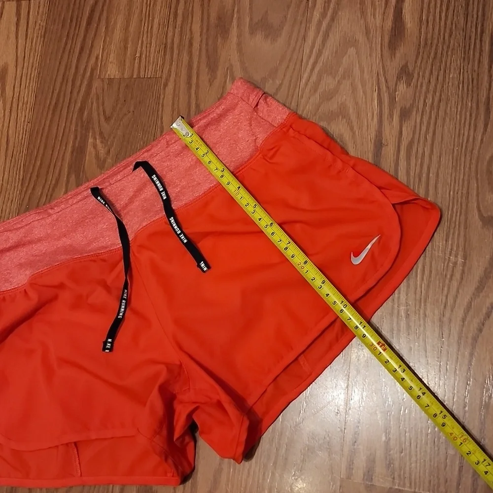Nike running shorts med‎